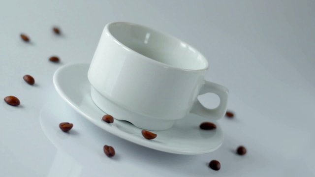 Hot coffee is poured in a cup