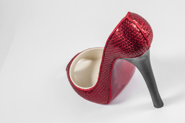 Red high heel shoe