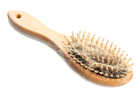 comb brush with lost hair, isolated on white