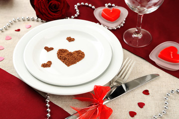 Table setting in honor of Valentine's Day close-up