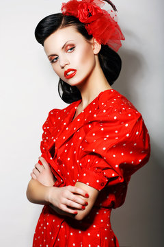 Arrogant Woman in Red Polka Dot Dress, Crossed Arms. Pin Up