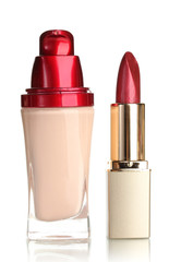 Beautiful red lipstick and foundation, isolated on white