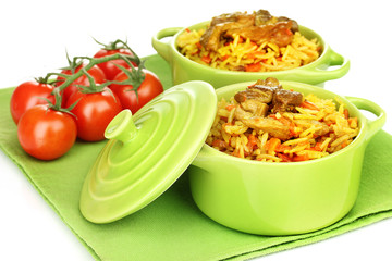 Delicious pilaf with tomato isolated on white