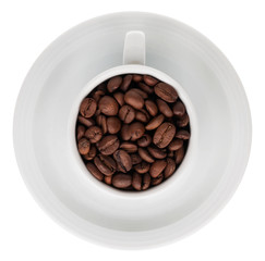 Coffee cup full of coffee beans
