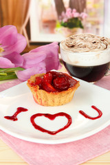 Sweet cake with strawberry and sauce