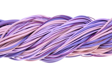 Twisted violet network computer cables isolated on white