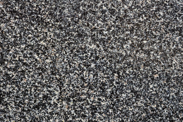 Polished white and black grain granite as background