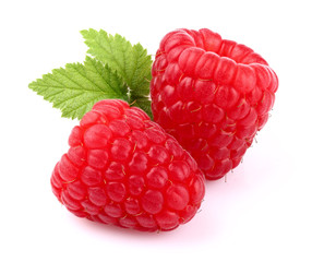 Two ripe raspberry with leaf