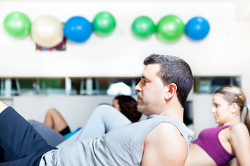 Group of people in aerobics class at the gym