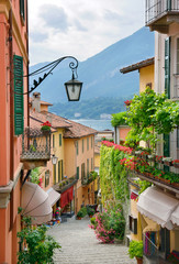 Picturesque small town street view in Lake Como Italy - obrazy, fototapety, plakaty
