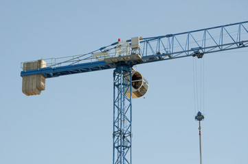 Construction crane - building a house - obrazy, fototapety, plakaty