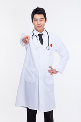 Young asian doctor pointing you