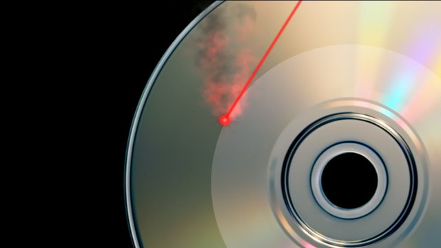 Rotating CD DVD burning animation with laser beam