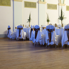 an image of tables setting at a luxury wedding hall
