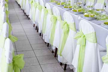 table set for wedding dinner decorated with flowers