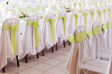 ribbon decoration on wedding chairs cover