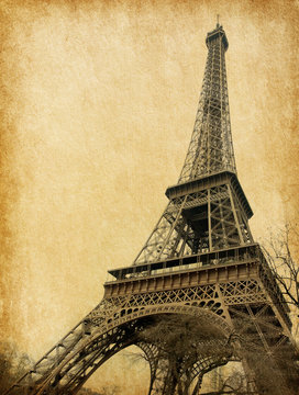 Eiffel tower. Photo in retro style. Paper texture.