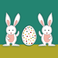 Two Baby Easter bunnies with egg