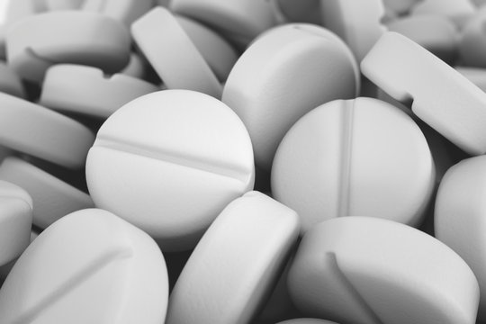 Pile of white pills.