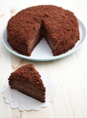 Homemade chocolate blackout cake with a cut piece