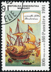 stamp printed in Malagasy  shows caravelle Amsterdam, 1599