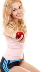 Young happy healthy woman with fresh ripe red apple