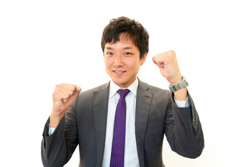 ガッツポーズのビジネスマン