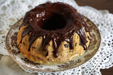 Bundt cake or Gugelhupf, yeast dough with raisins and chocolate