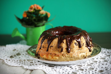 Bundt cake covered with melted dark chocolate