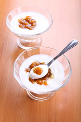 Closeup of natural yoghurt with jam