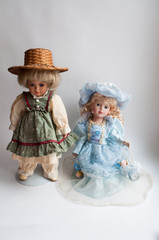 Pretty doll in the antique dress