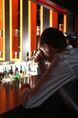 Sad Young Man at the Bar