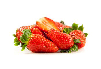 Strawberries with leaves. Isolated on a white background.