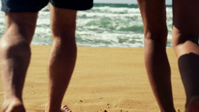 Couple Legs Walking On The Beach, Slow Motion Shot At 120fps