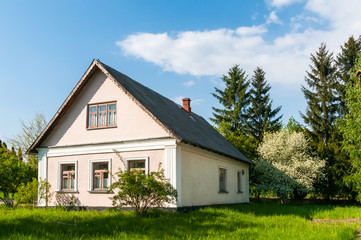 Fototapeta na wymiar A typical Ukrainian house, in the countryside near Kiev 