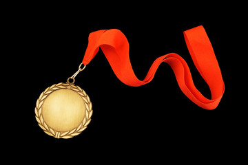 Gold medal with red ribbon isolated on black - obrazy, fototapety, plakaty