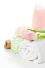 Spa setting with bath accessories and tulips