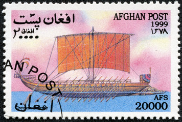 Stamp printed in Afghanistan shows sailboat
