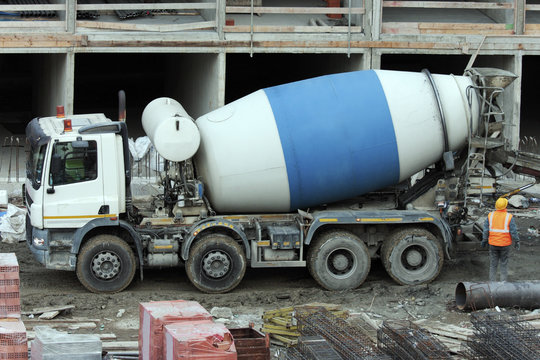 Cement mixer truck at work on a construction site	