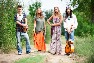 Hippie Group Dancing in the Countryside