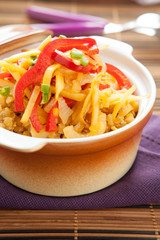 porridge made of pink lentils in a ceramic pot