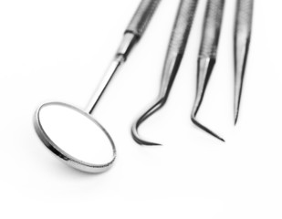Basic dentist tools isolated on white