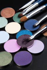 purple eye-shadows with brush