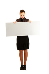 A young girl with a blank isolated on white background