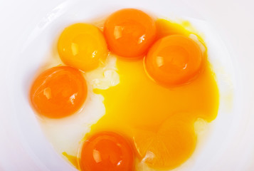 Group of broken eggs