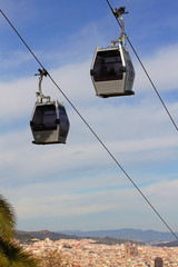 Ropeway on background of Barcelona, Spain