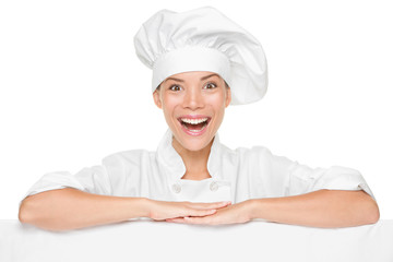 Chef or baker woman showing sign billboard excited