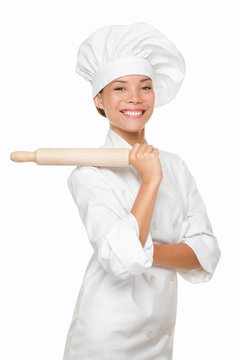 Baker woman smiling proud with baking rolling pin