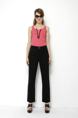 Fototapeta premium Young beautiful in sunglasses smiling stylish woman isolated