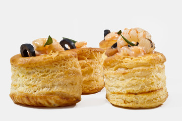 voulevant with shrimps and olives sauce close up